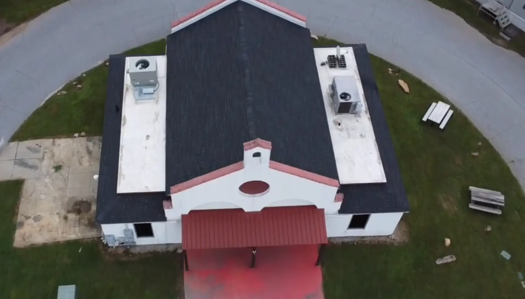 Fully restored Firehouse building with brand new Charcoal architectural shingle roof and freshly painted white fascia/soffit.